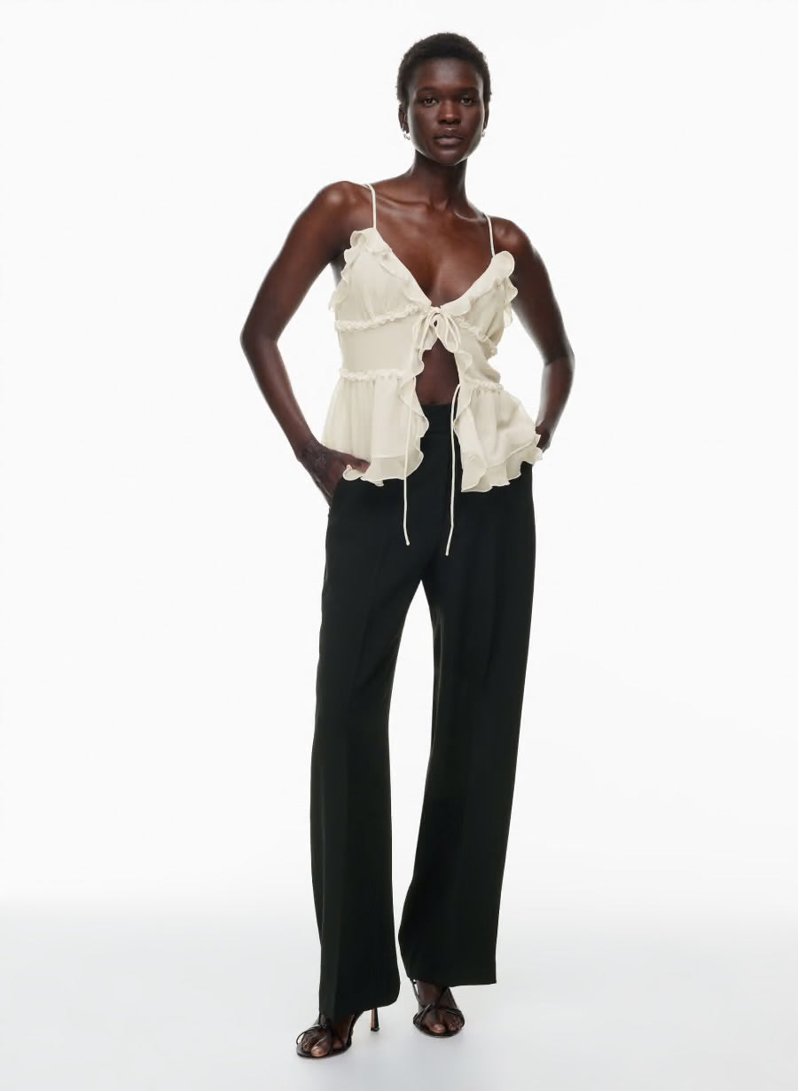 Wilfred
The Effortless
High-waisted, wide-leg Japanese crepe trousers, size 6
