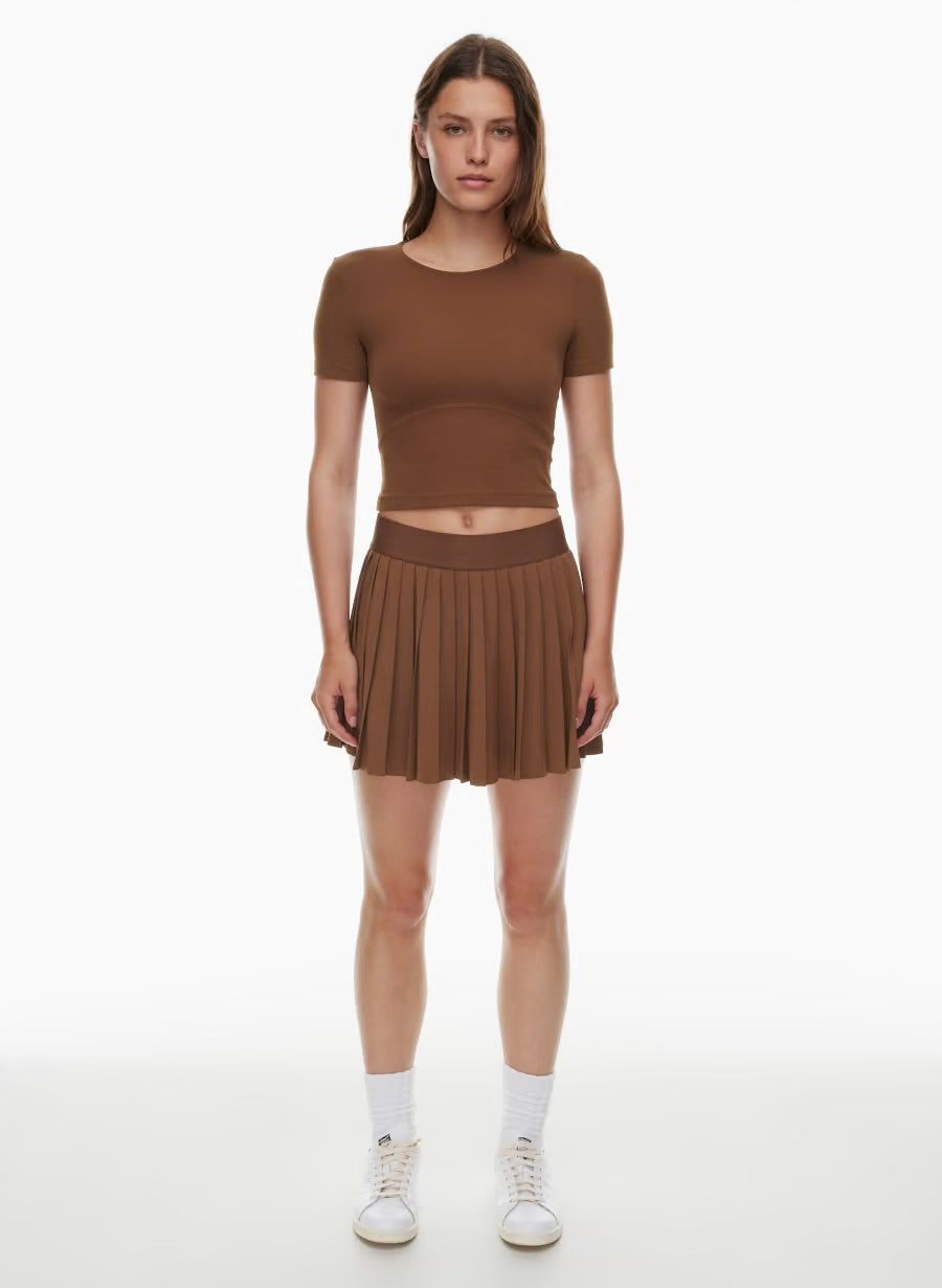 TNA Golden
MoveTech™ Tennis Pro Micro Skirt
Tennis micro skirt with built-in shorts and ball pockets, SMALL