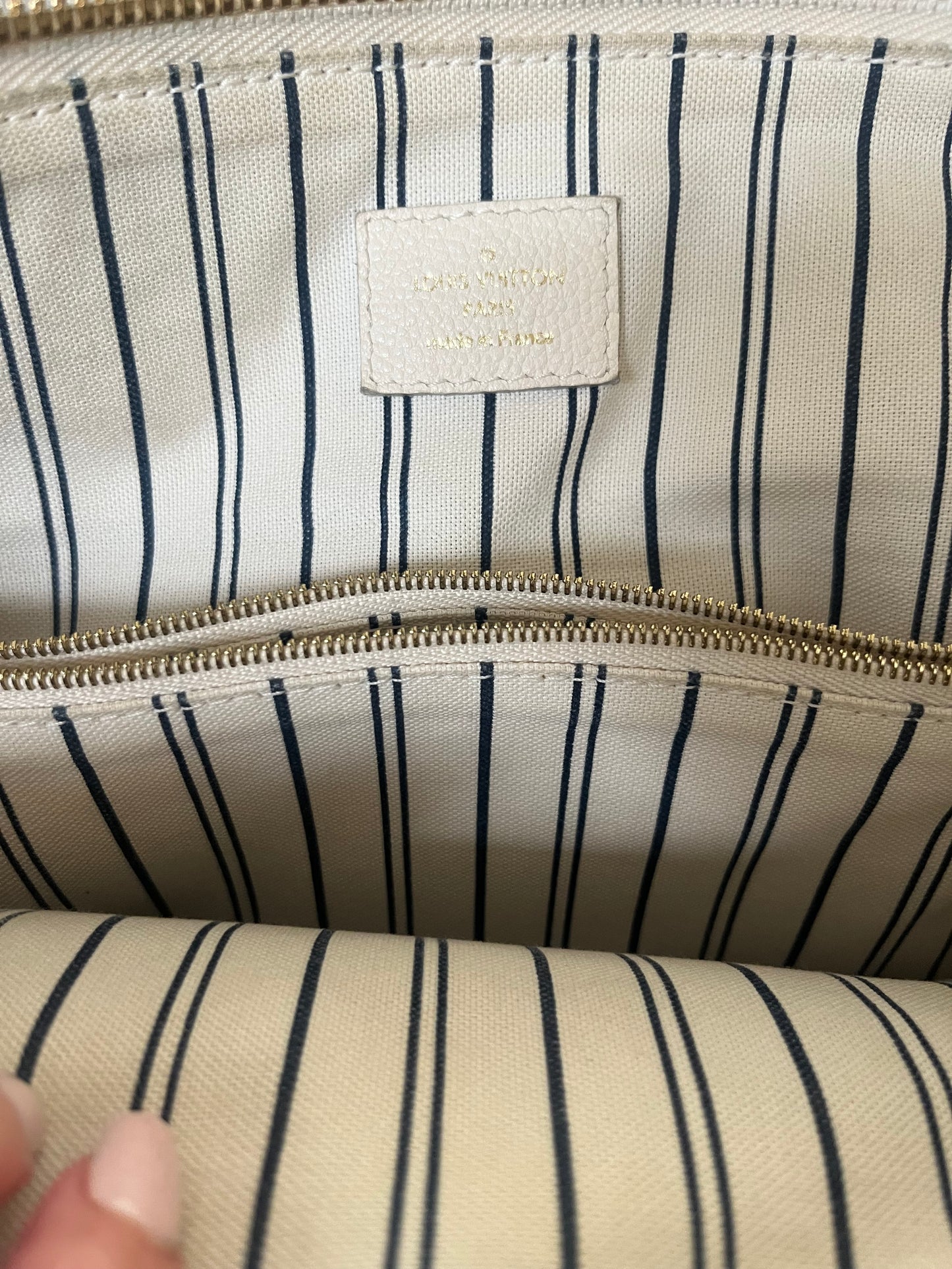 Louis Vuitton
Monogram Empreinte Lumineuse PM
