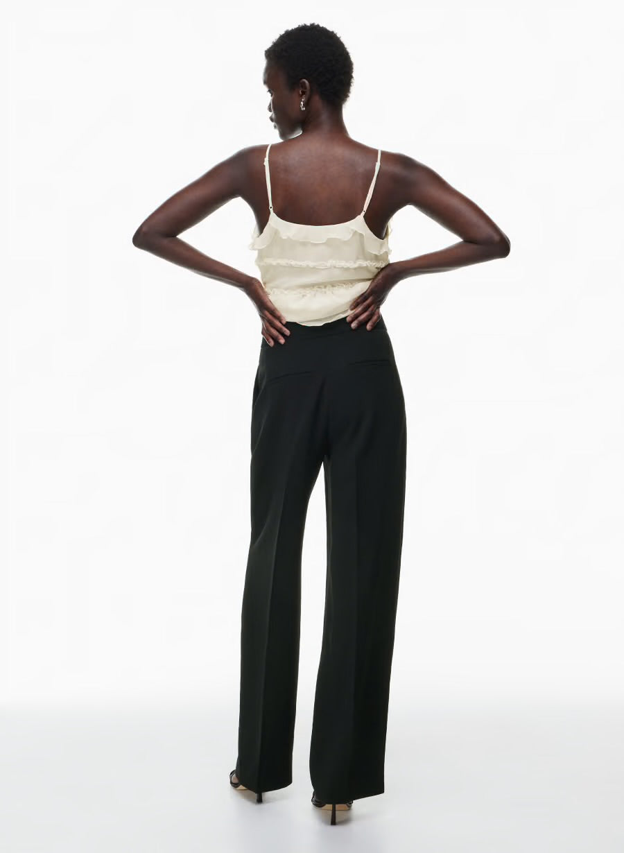 Wilfred
The Effortless
High-waisted, wide-leg Japanese crepe trousers, size 6