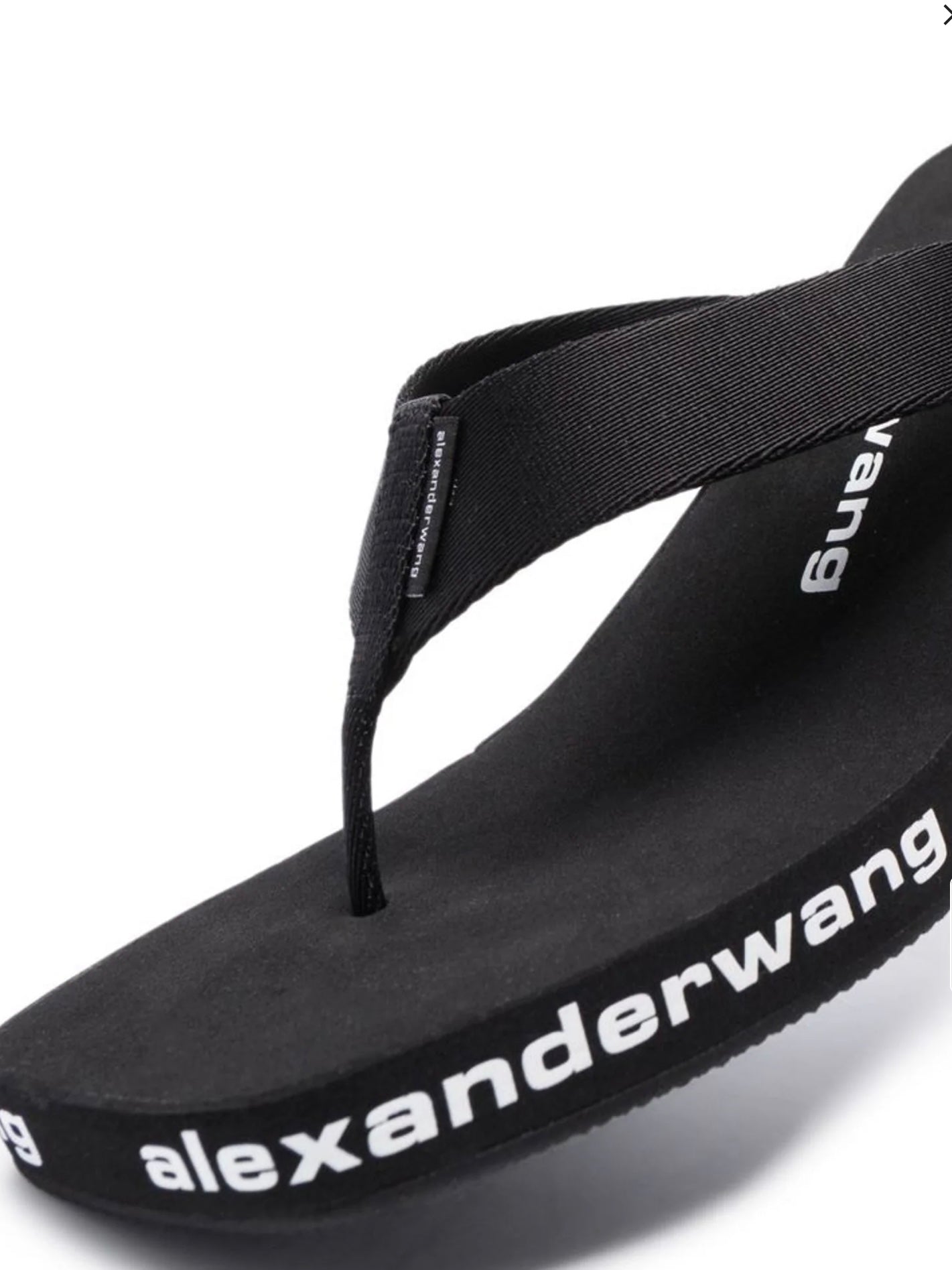Alexander Wang
logo-print wedge flip flops, SIZE 6